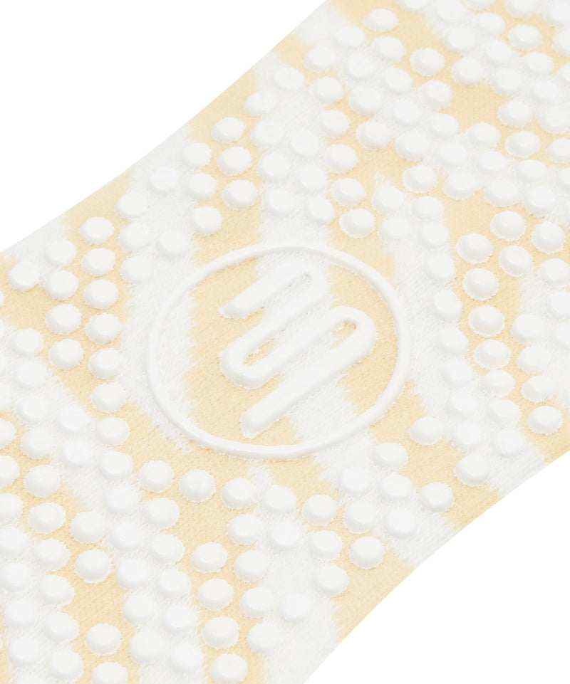Comfortable and secure grip socks featuring a seashell swirl design