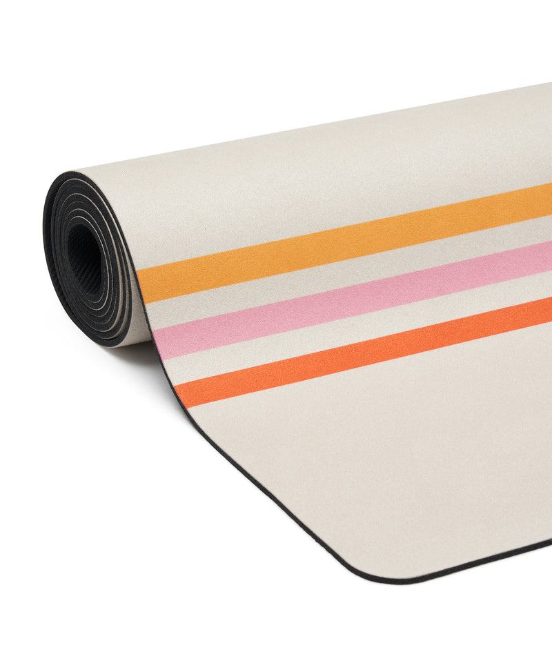 High-quality eco-friendly yoga mat featuring 70s-inspired striped pattern