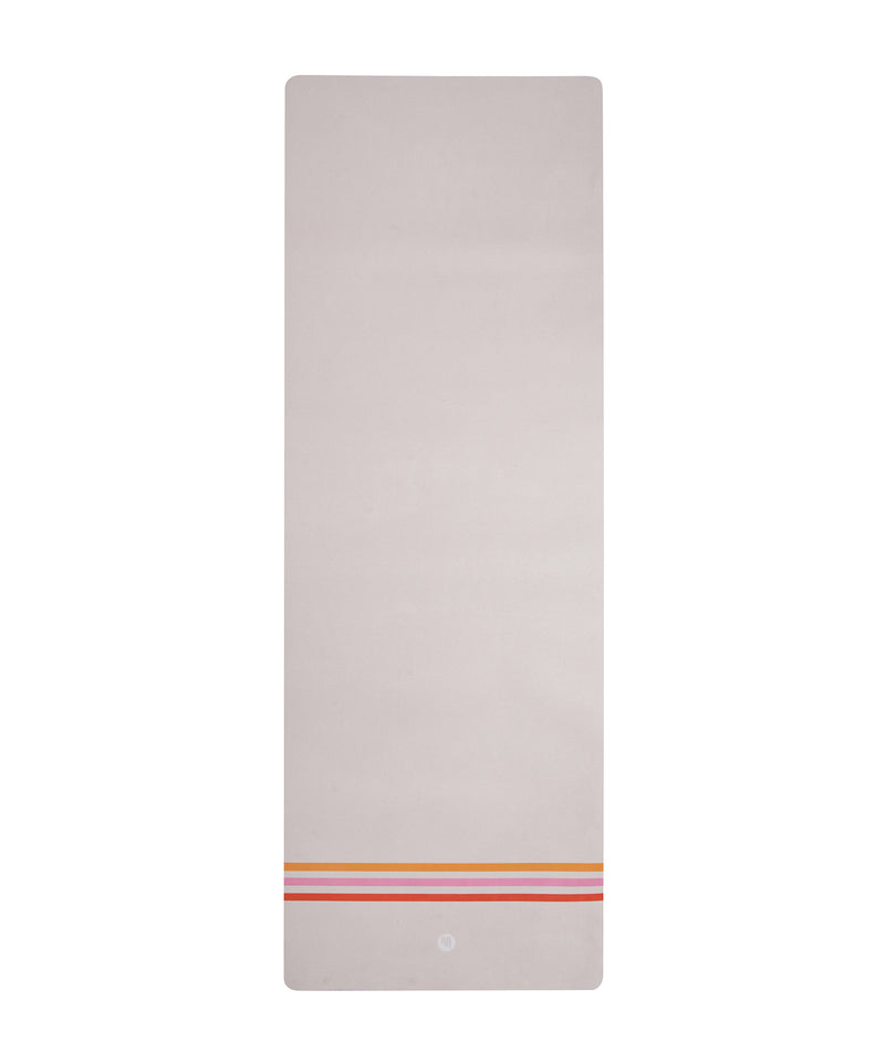 Luxe Recycled Yoga Mat with 70s Stripes in vibrant pink and orange