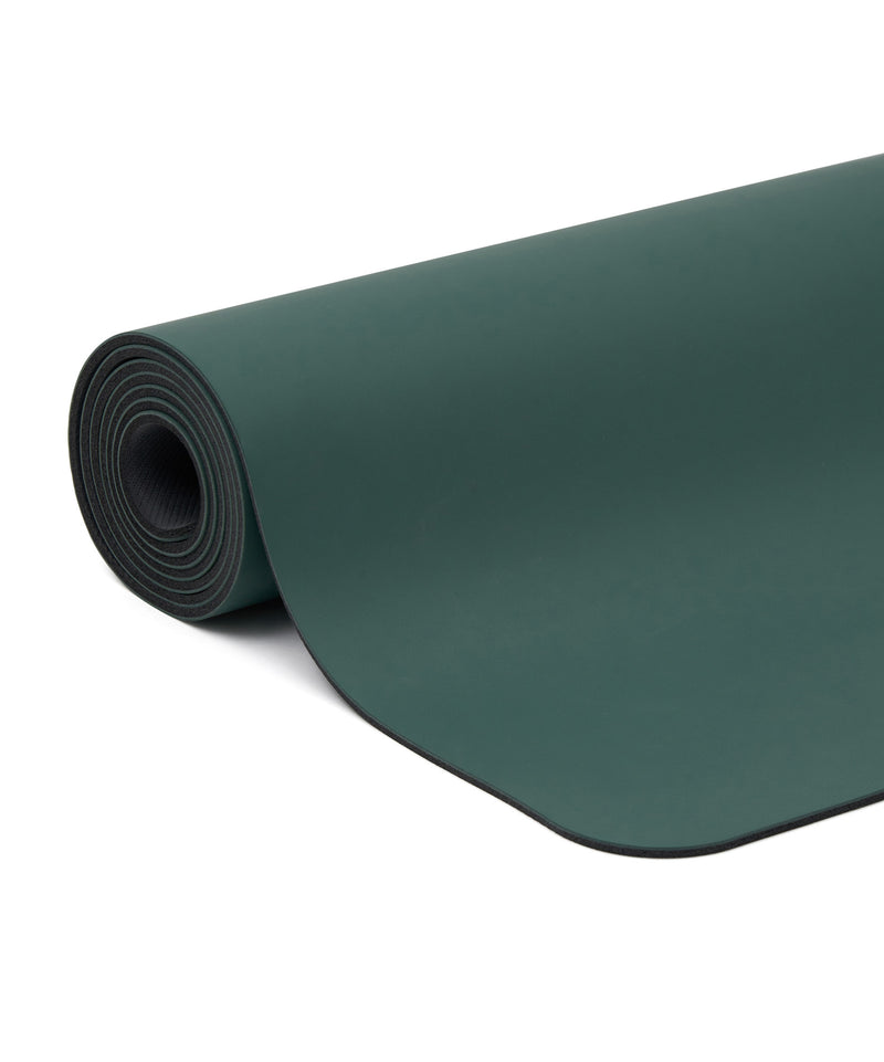 Luxurious and sustainable yoga mat crafted from vegan leather in a serene forest green shade