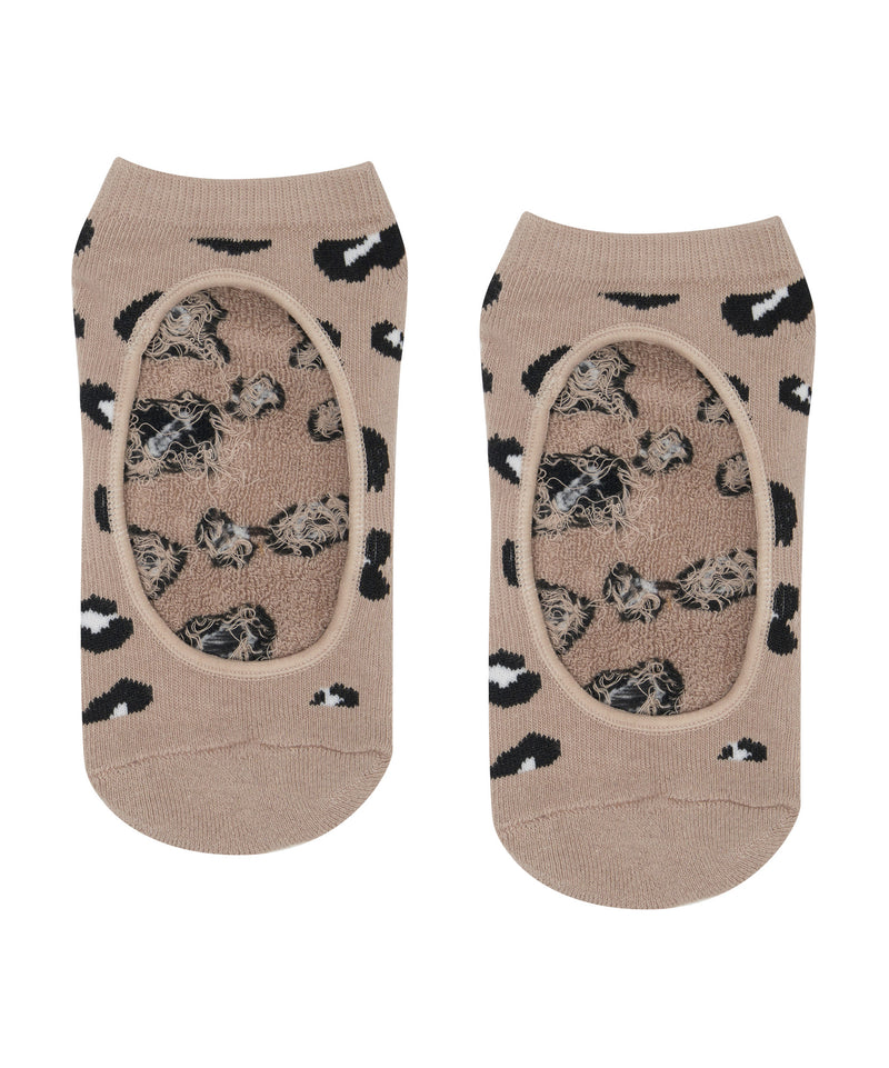  Stylish nude-colored socks with cheetah pattern for extra grip 