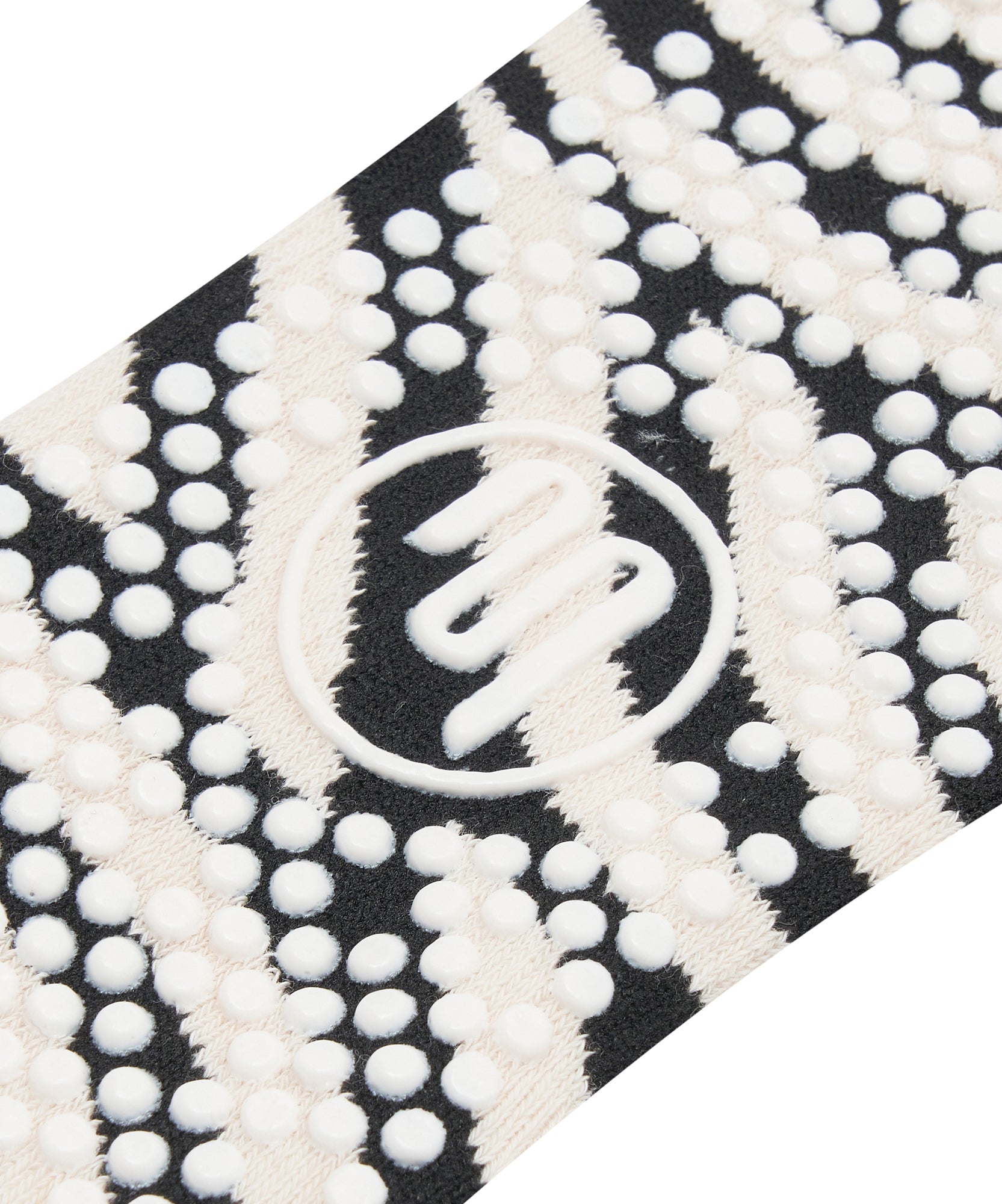 Fashionable and functional low rise grip socks with a monochrome swirl design