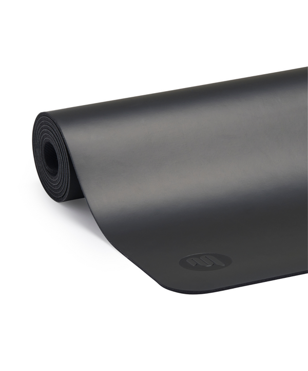 Luxurious and durable yoga mat made of vegan leather in classic black