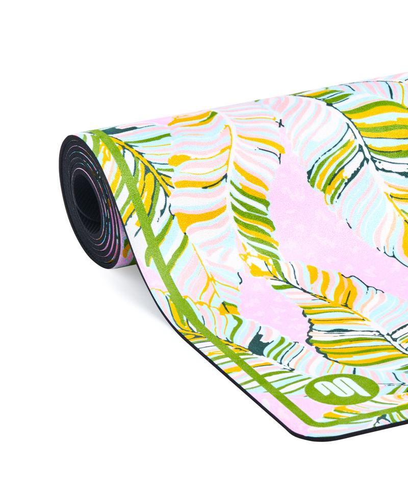 High-quality and sustainable yoga mat in a beautiful pink leaf pattern